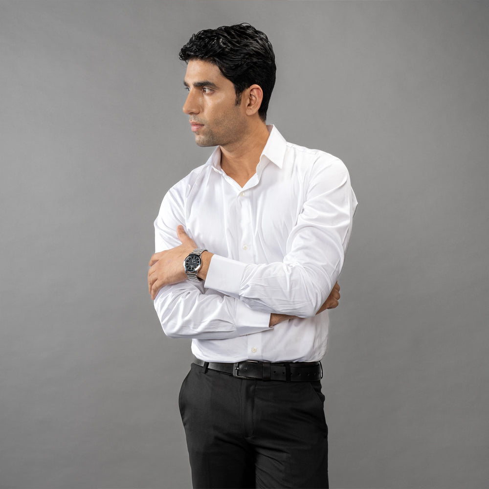 crisp formal shirt, tailored from pristine Giza Cotton and embellished with Trochus shell buttons