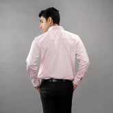 Giza Cotton shirt featuring a spread collar and round cuffs — polished model posing backward