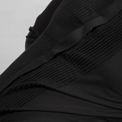 ustrous Giza Cotton and adorned with natural mother‑of‑pearl buttons