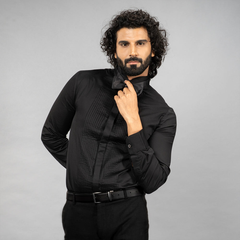 The Gala Tux redefines partywear with a wing collar, hidden placket, and French cuffs. Crafted from lustrous Giza Cotton and adorned with natural mother‑of‑pearl buttons and metal cufflinks,