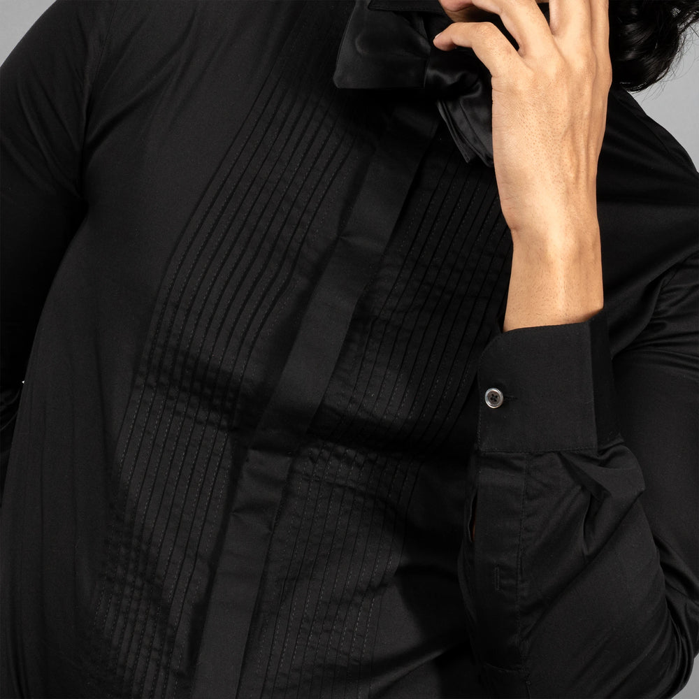 The Gala Tux partywear with a wing collar, hidden placket, and French cuffs. Crafted from lustrous Giza Cotton and adorned with natural mother‑of‑pearl buttons and metal cufflinks,