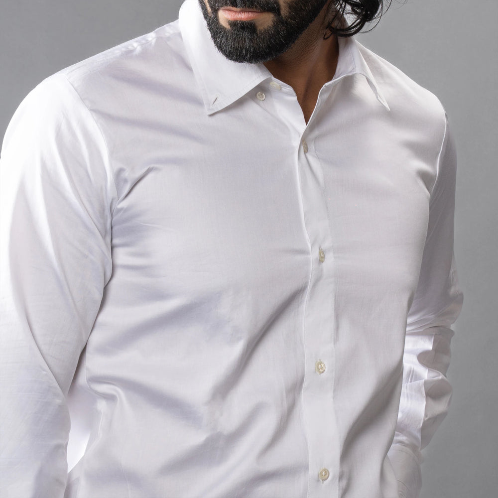 closeup shot of Giza Cotton, and finished with naturally marbled Trochus shell buttons