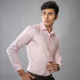 model side pose wearing brand appril luxurious Giza Cotton, and finished with naturally marbled Trochus shell buttons shirt