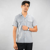 premium linen camp‑collar shirt with dual chest pockets of brand appril