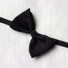 Black bow tie on a white background wide angle
