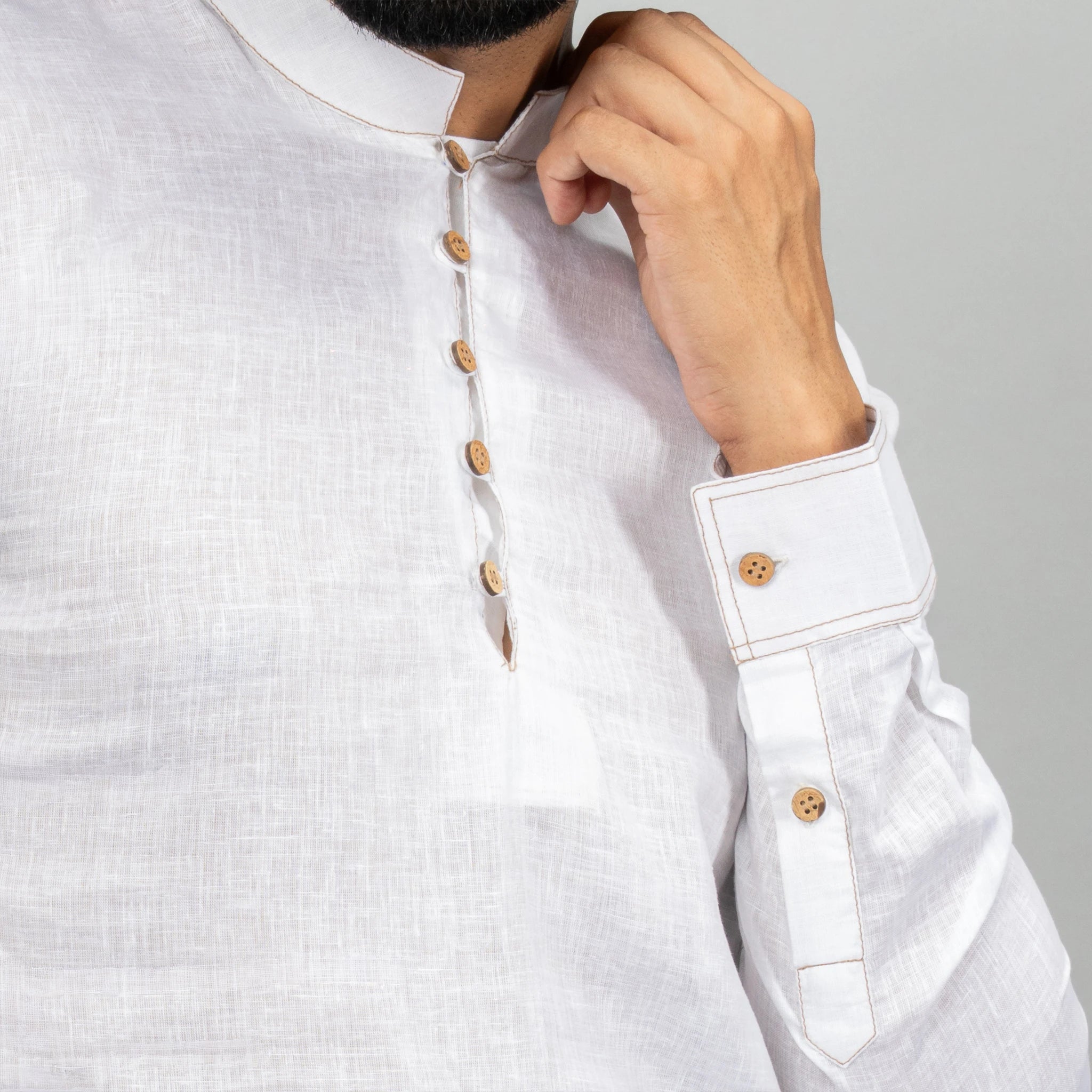 coconut shell buttons and contrast stitching for a natural touch