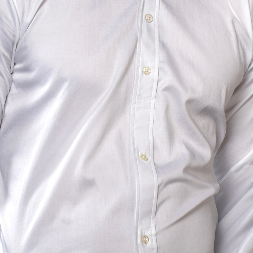 Close-up of a  brand appril white button-up shirt with a focus on texture and fabric.