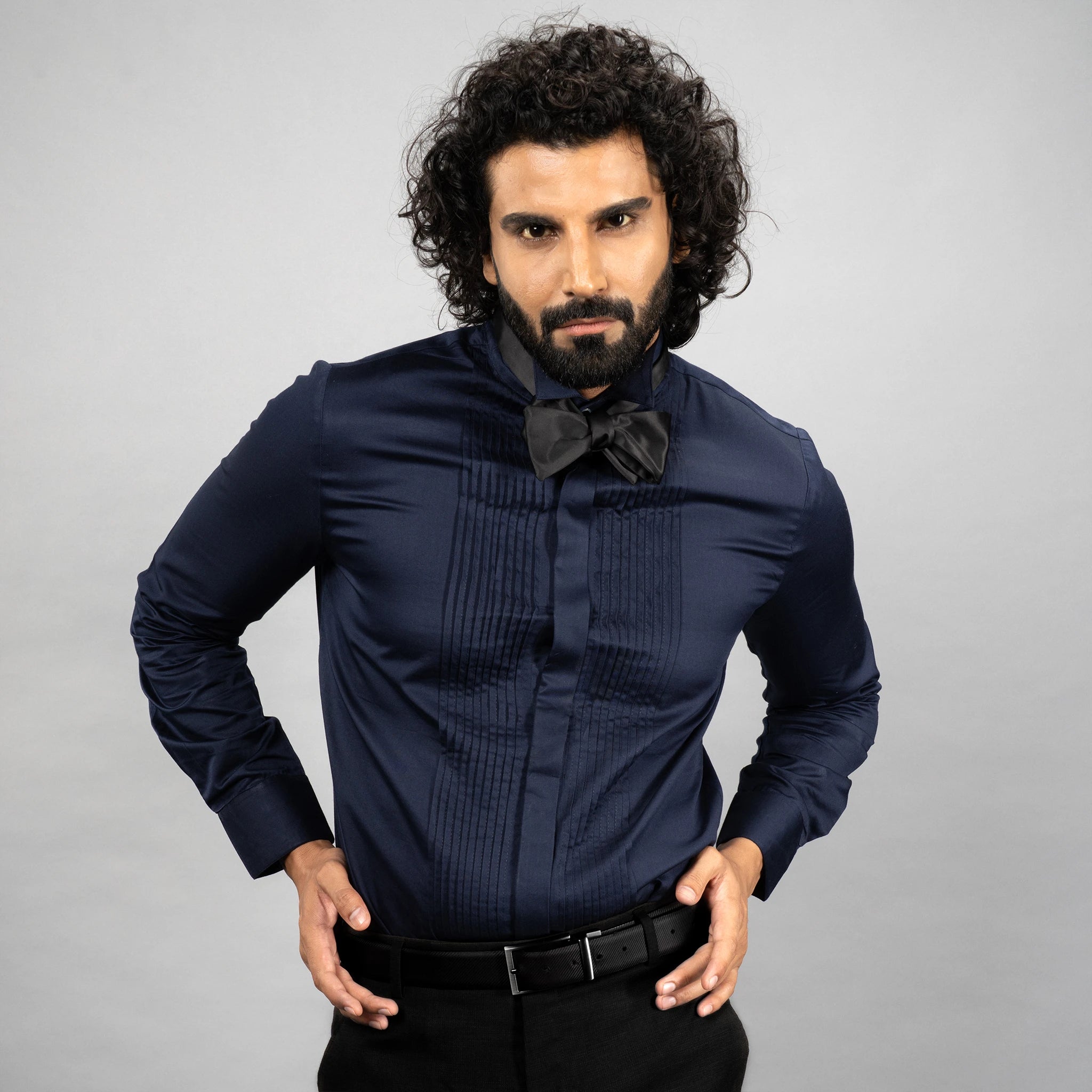 The Gala Tux redefines partywear with a wing collar, hidden placket, and French cuffs.