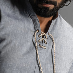 clode up shot of lace‑up linen shirt 