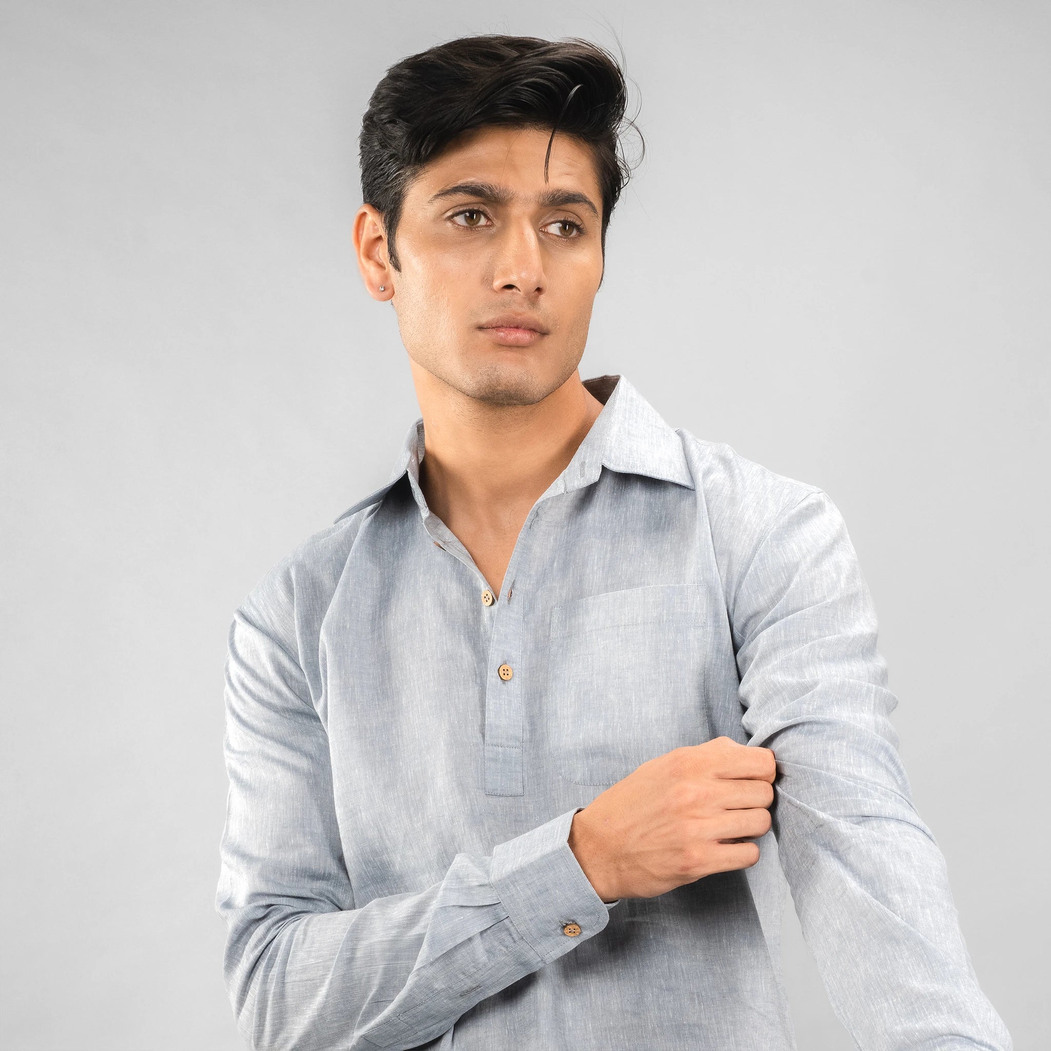 model face angle casual‑luxury linen half‑placket shirt with coconut shell buttons 