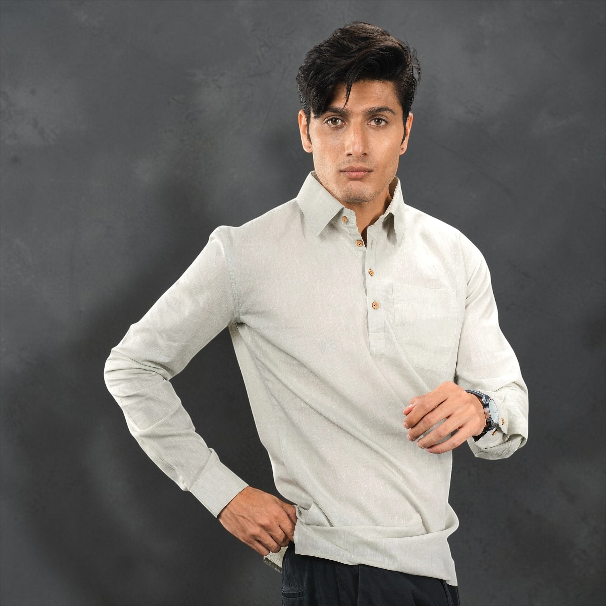 A casual‑luxury linen half‑placket shirt with coconut shell buttons and a relaxed fit