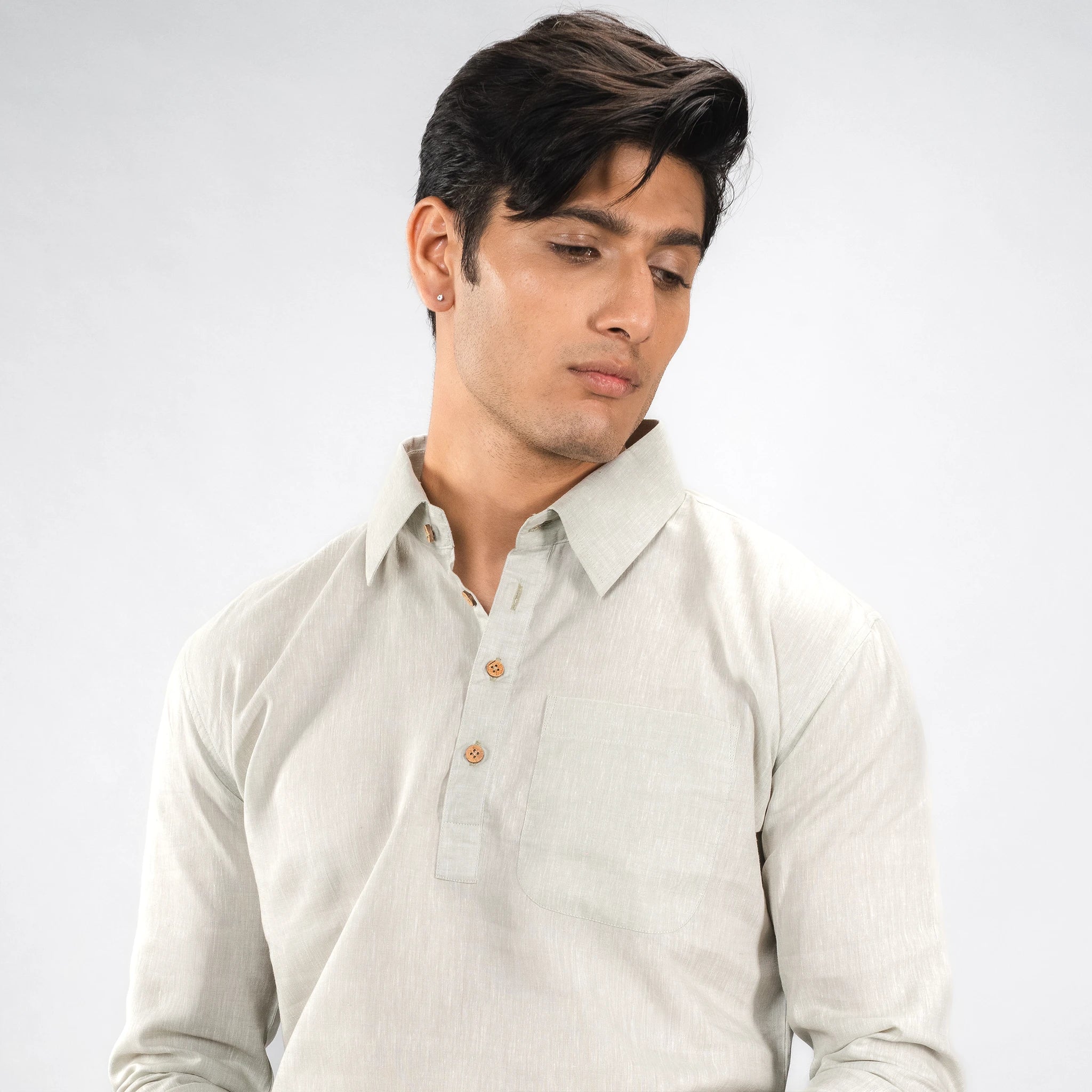 man posing side face angle coconut shell buttons