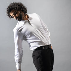 Your definitive formal shirt — button down collar and turnback cuffs, with box pleat back. Made from luxurious Giza Cotton, and finished with naturally marbled Trochus shell buttons, each shirt is a quiet expression of sophistication 