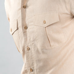 dual chest pockets finished with natural coconut shell buttons 